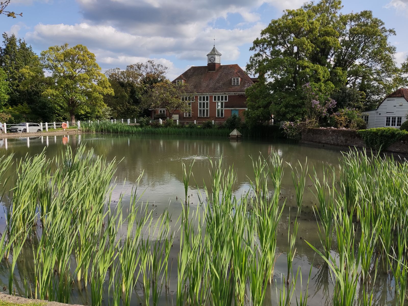 Goudhurst Village duck pond with the village hall in the background